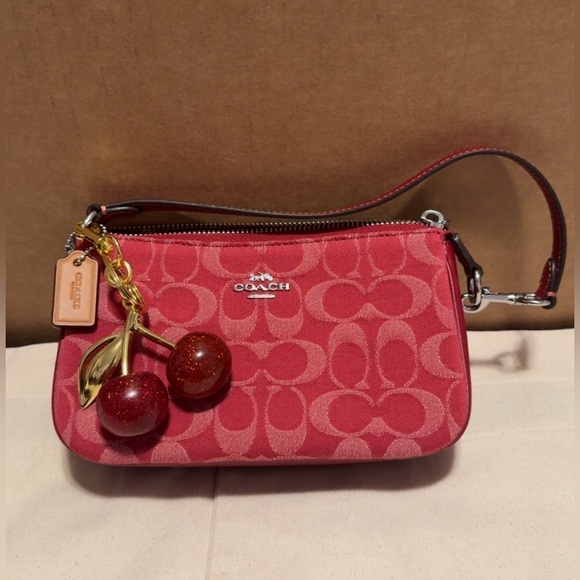 Coach Handbags - Nolita 19 in signature Red Denim with Cherry charm 🍒